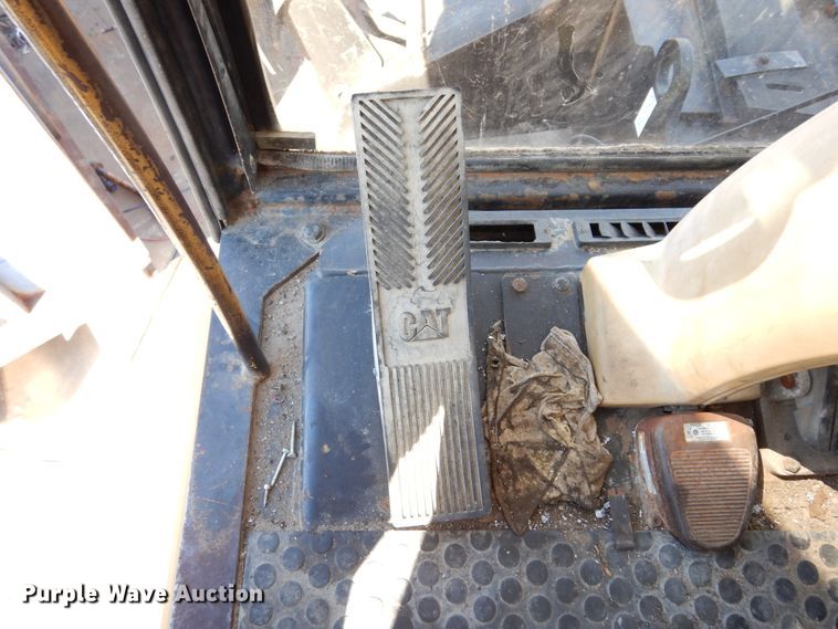 image for item DK0306 1998 Caterpillar M318  wheeled excavator