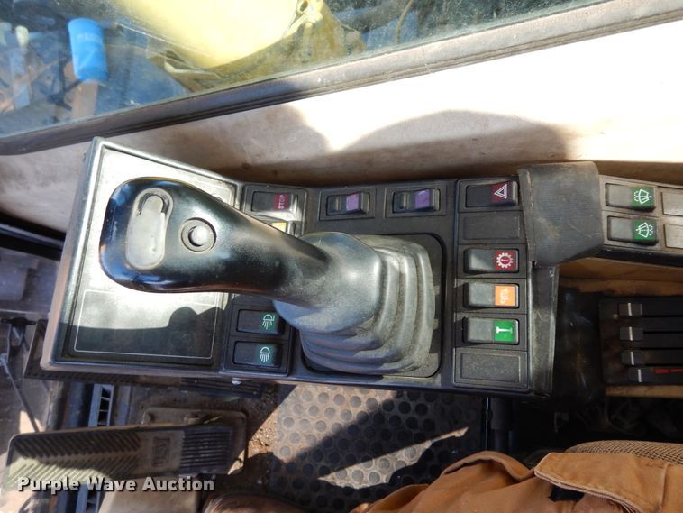 image for item DK0306 1998 Caterpillar M318  wheeled excavator