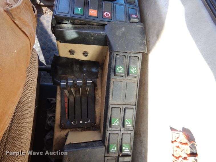 image for item DK0306 1998 Caterpillar M318  wheeled excavator