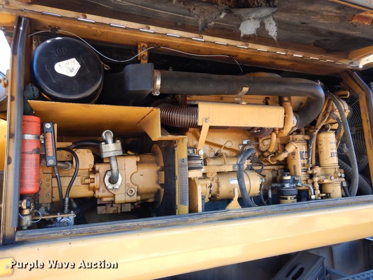 image for item DK0306 1998 Caterpillar M318  wheeled excavator