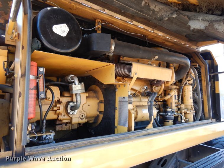 image for item DK0306 1998 Caterpillar M318  wheeled excavator