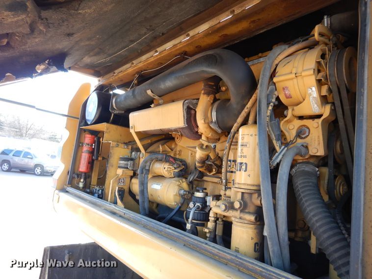 image for item DK0306 1998 Caterpillar M318  wheeled excavator