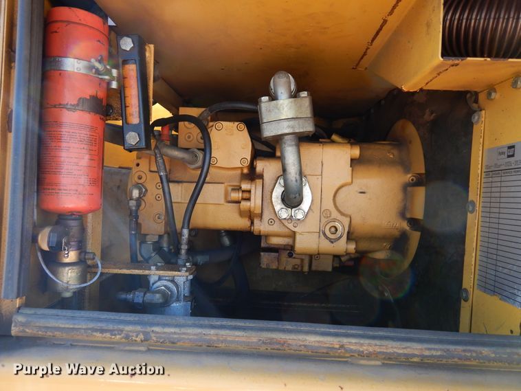 image for item DK0306 1998 Caterpillar M318  wheeled excavator