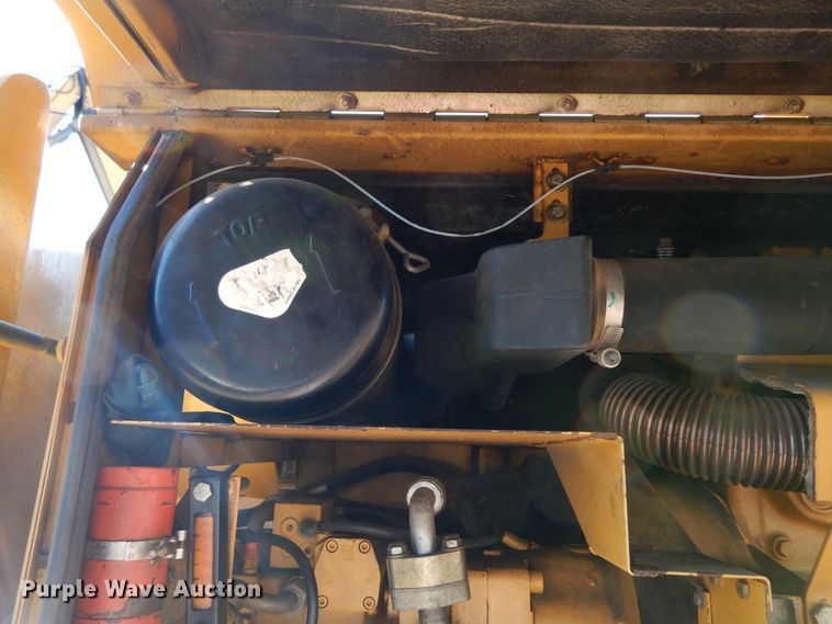 image for item DK0306 1998 Caterpillar M318  wheeled excavator