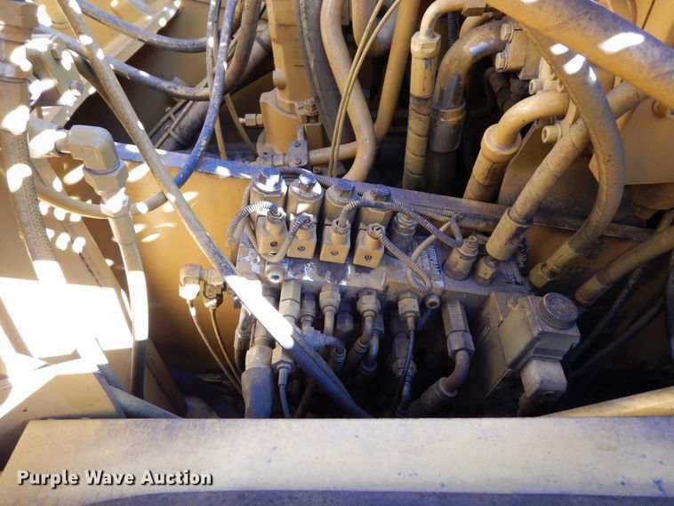 image for item DK0306 1998 Caterpillar M318  wheeled excavator