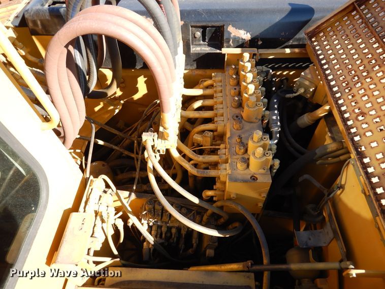 image for item DK0306 1998 Caterpillar M318  wheeled excavator