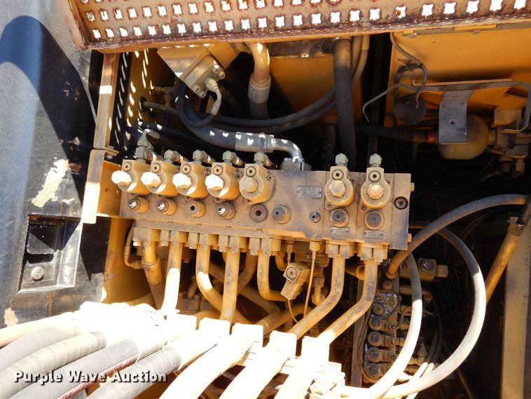 image for item DK0306 1998 Caterpillar M318  wheeled excavator