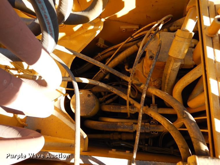 image for item DK0306 1998 Caterpillar M318  wheeled excavator