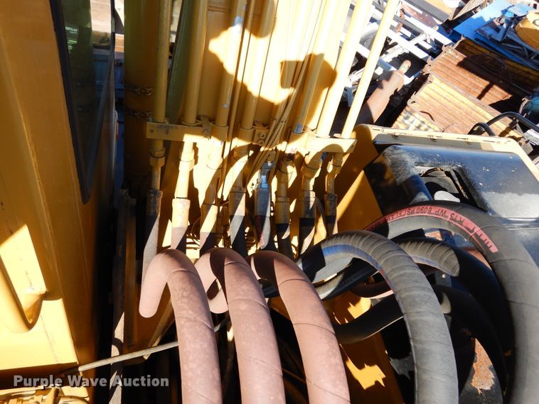 image for item DK0306 1998 Caterpillar M318  wheeled excavator