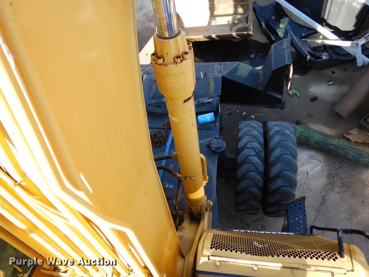 image for item DK0306 1998 Caterpillar M318  wheeled excavator