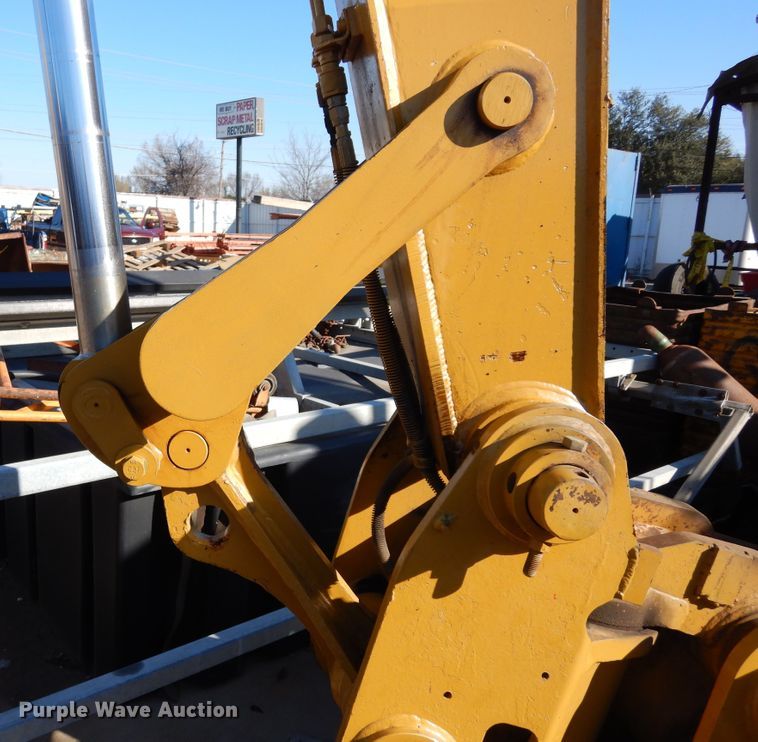 image for item DK0306 1998 Caterpillar M318  wheeled excavator