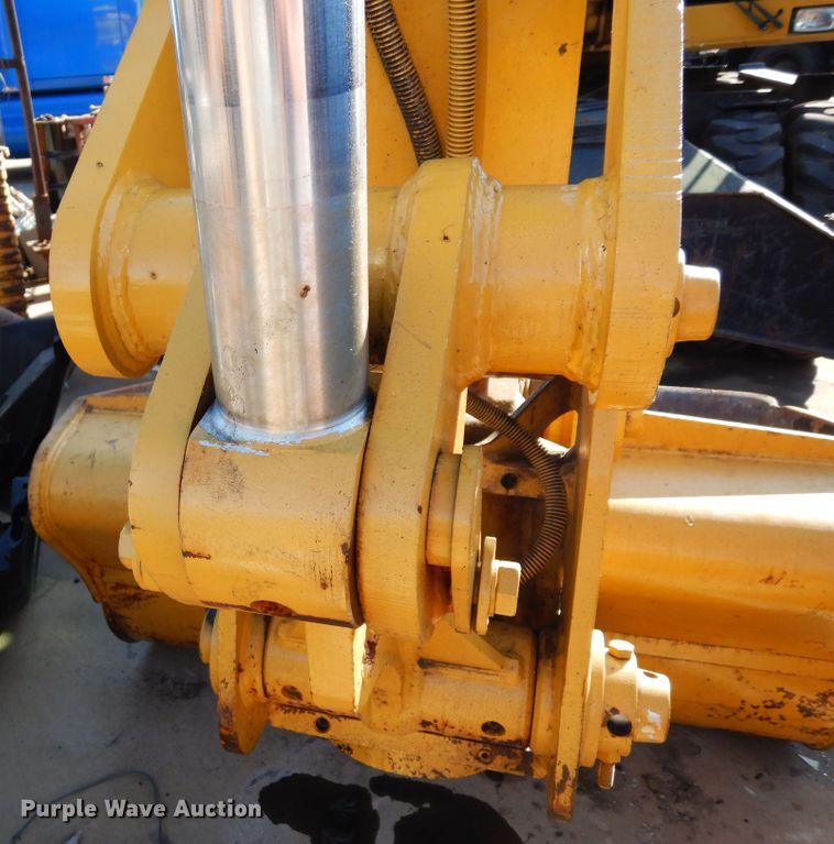 image for item DK0306 1998 Caterpillar M318  wheeled excavator