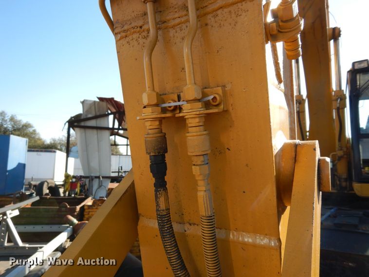 image for item DK0306 1998 Caterpillar M318  wheeled excavator