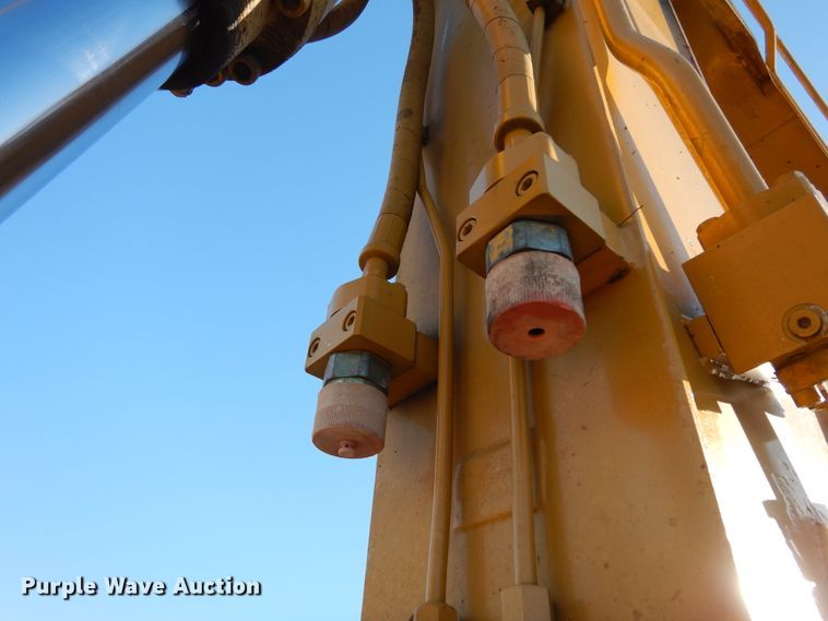 image for item DK0306 1998 Caterpillar M318  wheeled excavator