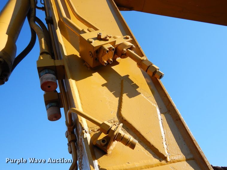 image for item DK0306 1998 Caterpillar M318  wheeled excavator