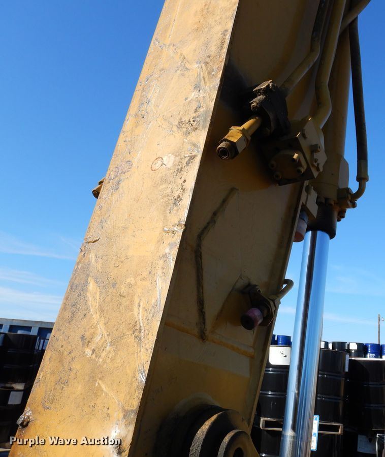 image for item DK0306 1998 Caterpillar M318  wheeled excavator