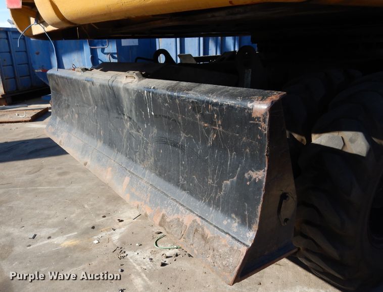 image for item DK0306 1998 Caterpillar M318  wheeled excavator