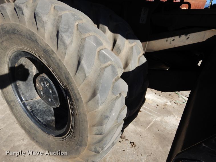 image for item DK0306 1998 Caterpillar M318  wheeled excavator