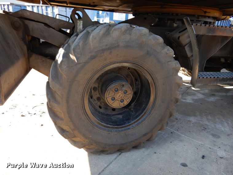 image for item DK0306 1998 Caterpillar M318  wheeled excavator