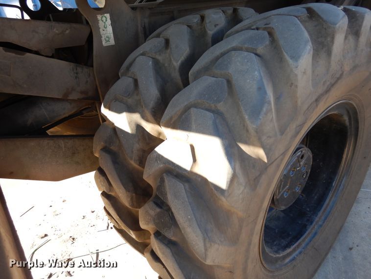 image for item DK0306 1998 Caterpillar M318  wheeled excavator