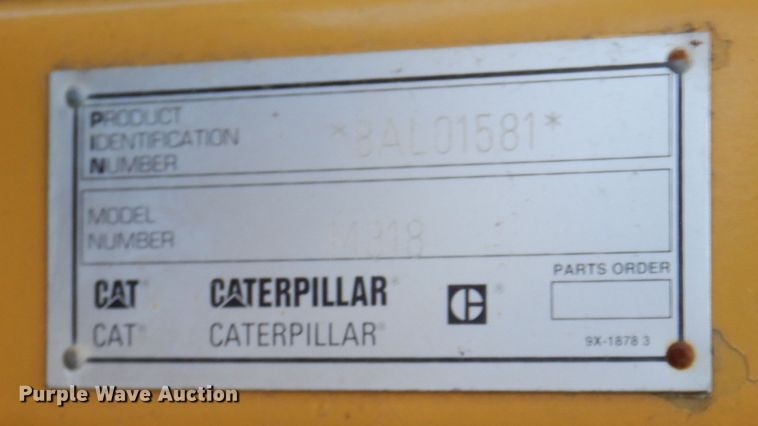 image for item DK0306 1998 Caterpillar M318  wheeled excavator
