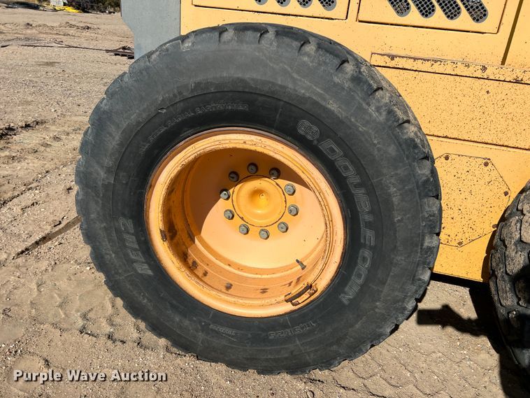 image for item DM8443 2002 Volvo G720VHP  motor grader