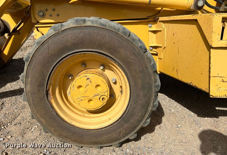 image for item DM8444 2004 John Deere 310G  backhoe