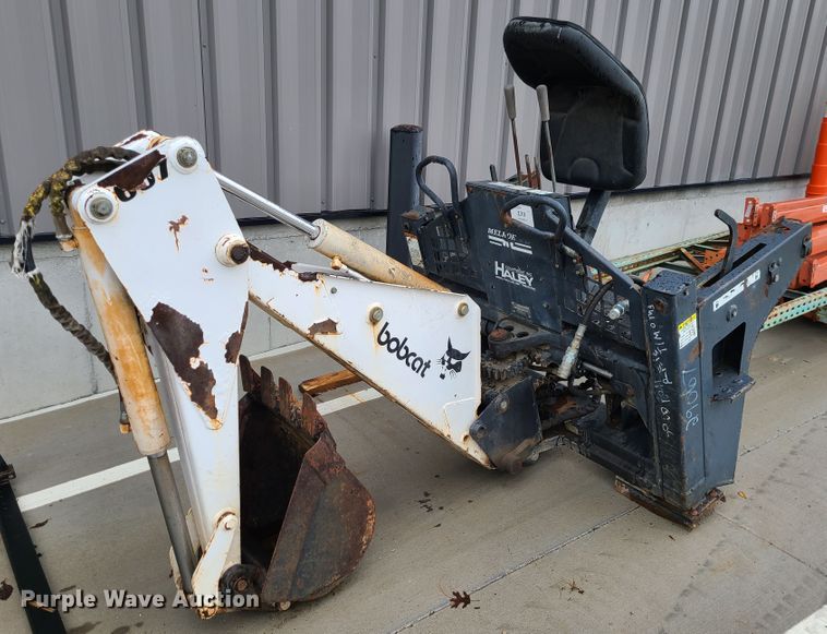 image for item IF9407 Bobcat 607 backhoe skid steer attachment