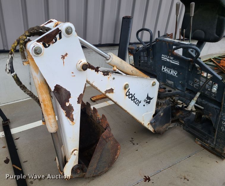 image for item IF9407 Bobcat 607 backhoe skid steer attachment