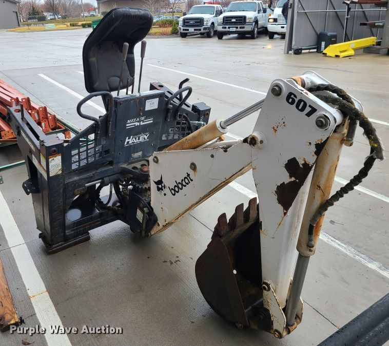 image for item IF9407 Bobcat 607 backhoe skid steer attachment