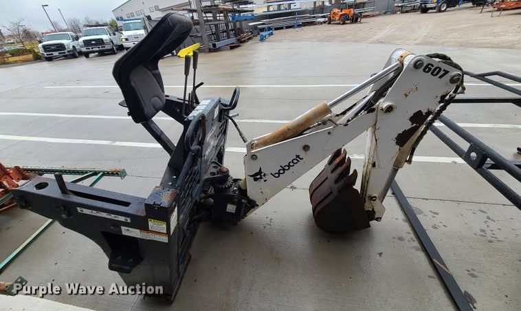 image for item IF9407 Bobcat 607 backhoe skid steer attachment