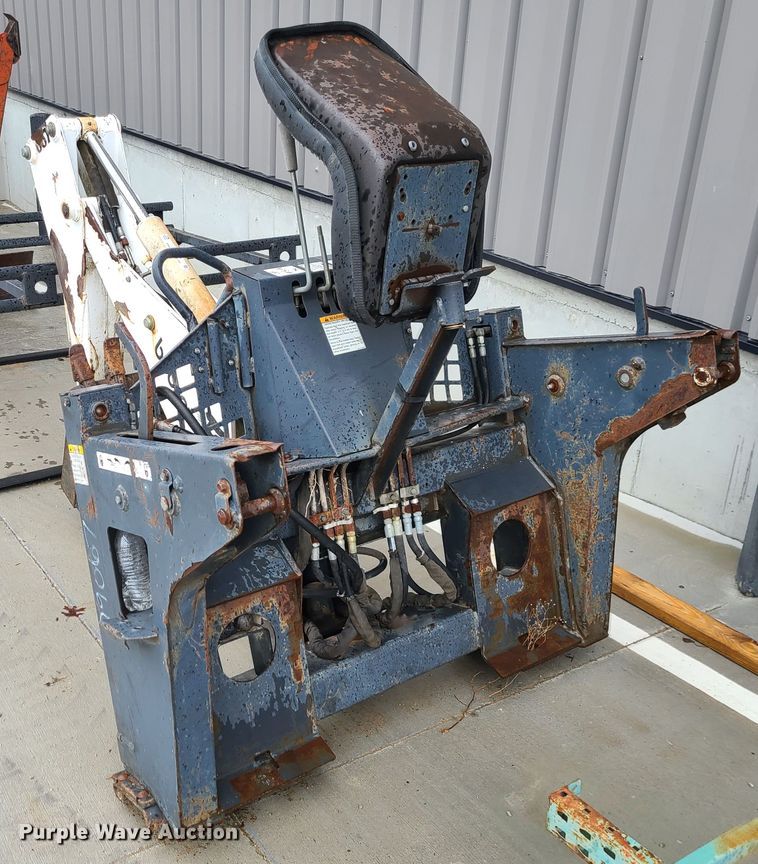 image for item IF9407 Bobcat 607 backhoe skid steer attachment