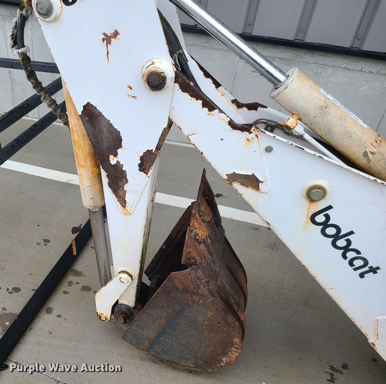 image for item IF9407 Bobcat 607 backhoe skid steer attachment
