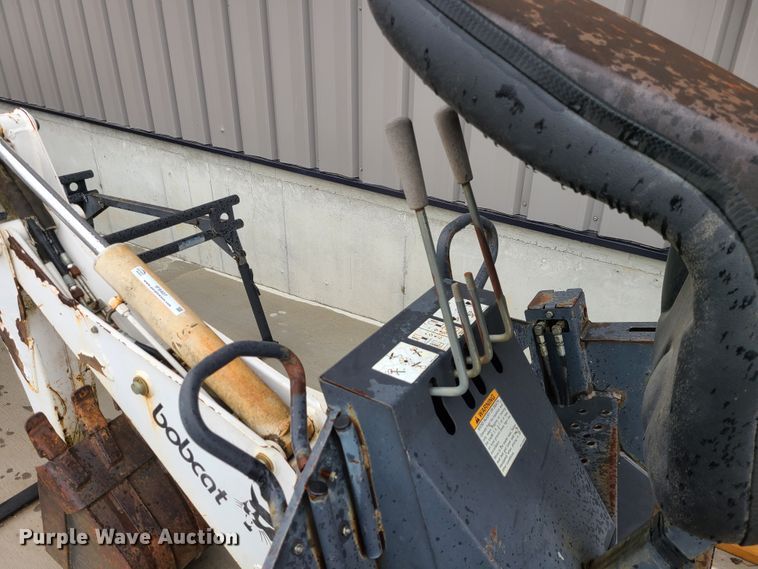 image for item IF9407 Bobcat 607 backhoe skid steer attachment