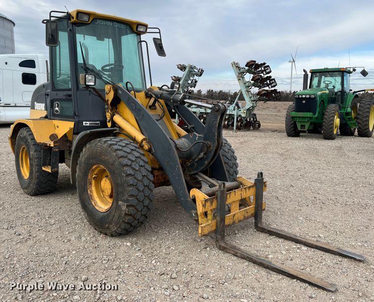image for item IG9280 2010 John Deere 304J  wheel loader