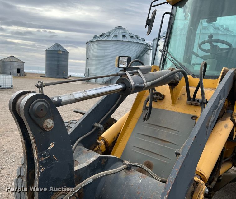 image for item IG9280 2010 John Deere 304J  wheel loader