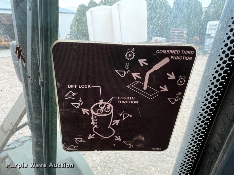 image for item IG9280 2010 John Deere 304J  wheel loader