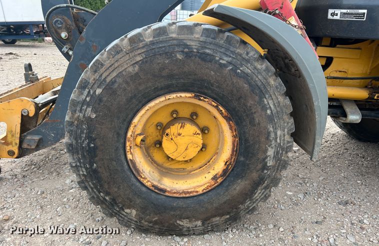 image for item IG9280 2010 John Deere 304J  wheel loader
