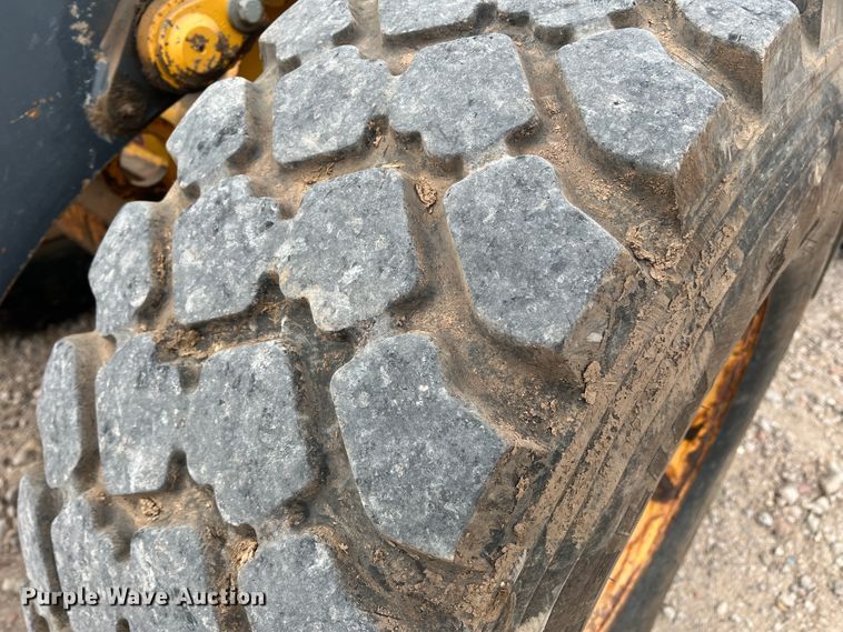 image for item IG9280 2010 John Deere 304J  wheel loader