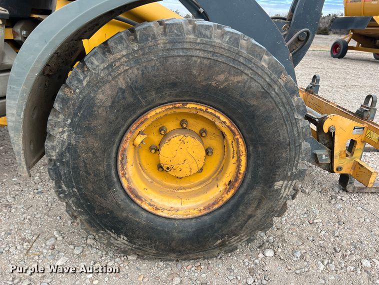 image for item IG9280 2010 John Deere 304J  wheel loader