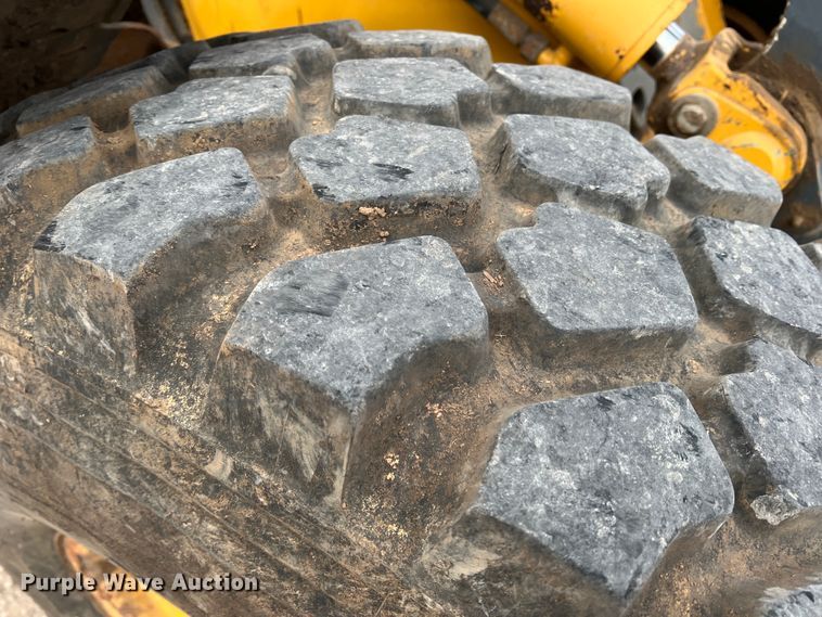 image for item IG9280 2010 John Deere 304J  wheel loader