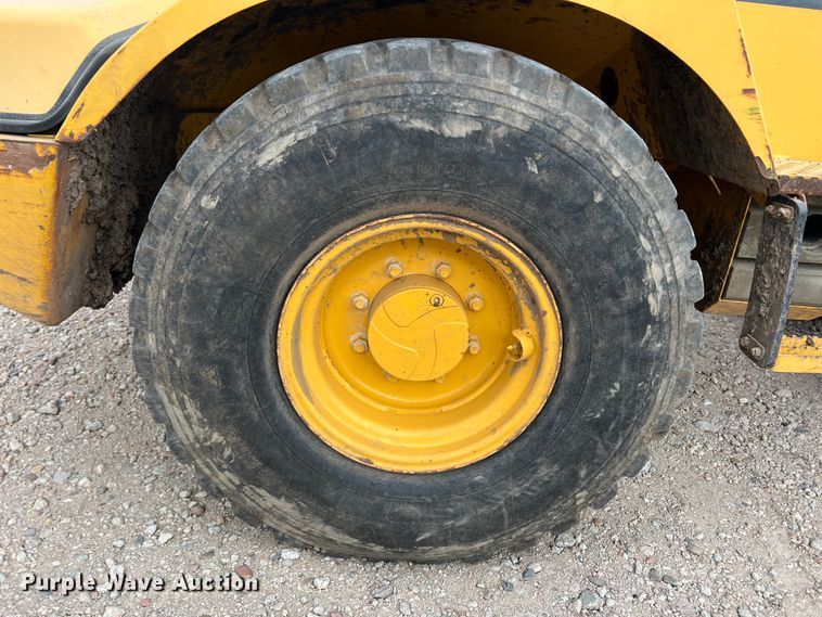 image for item IG9280 2010 John Deere 304J  wheel loader