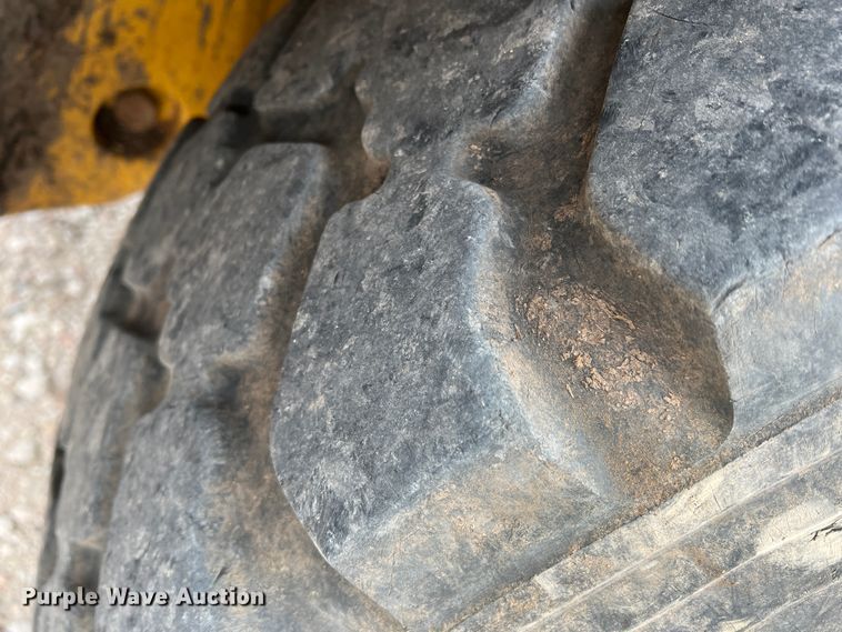 image for item IG9280 2010 John Deere 304J  wheel loader