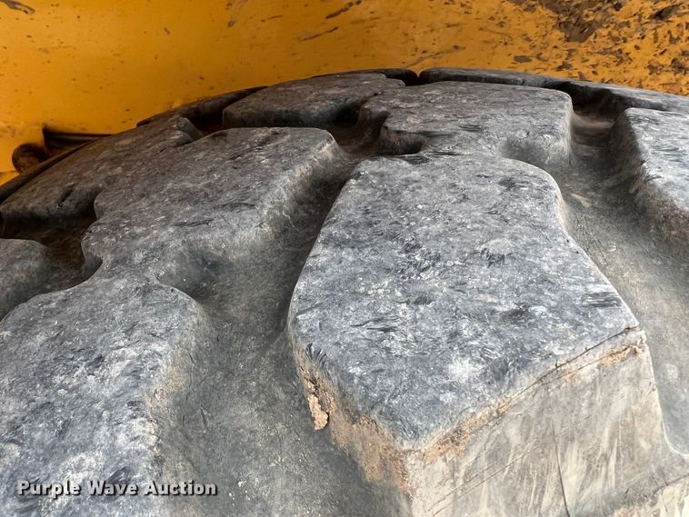 image for item IG9280 2010 John Deere 304J  wheel loader