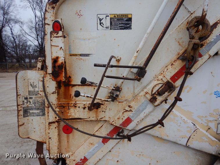 image for item IM9860 2000 International 4700  refuse truck