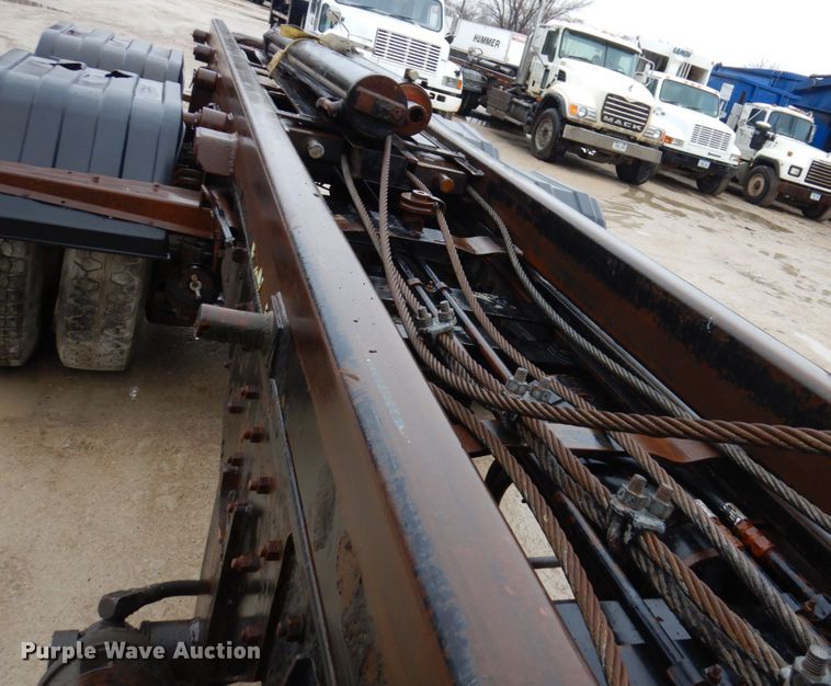 image for item IM9861 1995 Mack RD Series  roll-off container truck