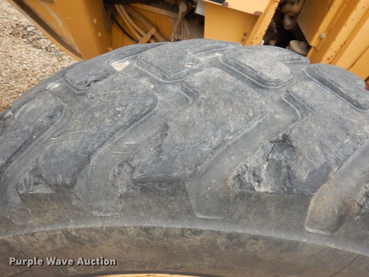 image for item DH8933 1998 Caterpillar 120H  motor grader