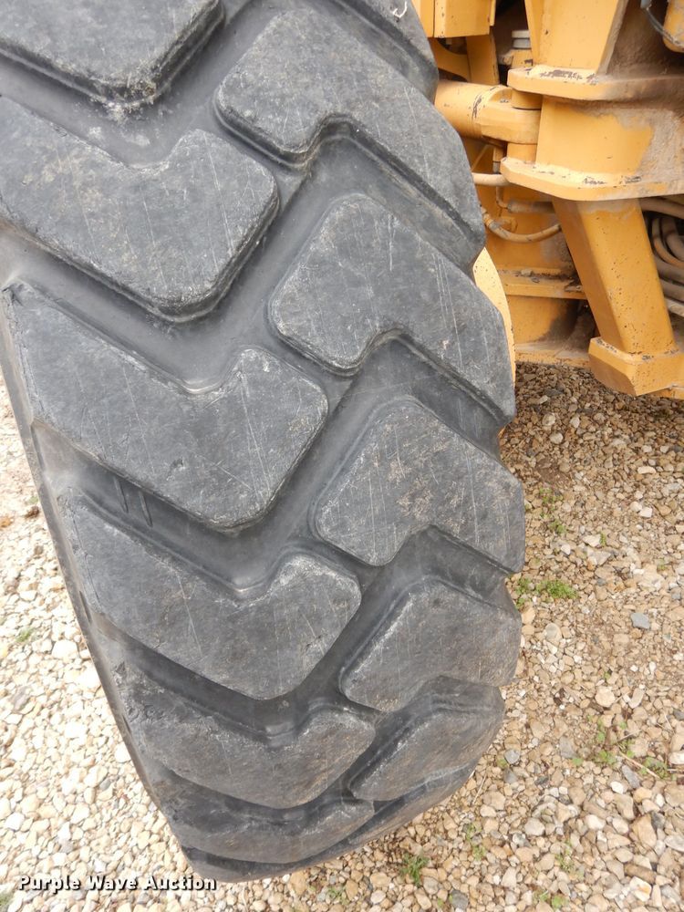 image for item DH8933 1998 Caterpillar 120H  motor grader