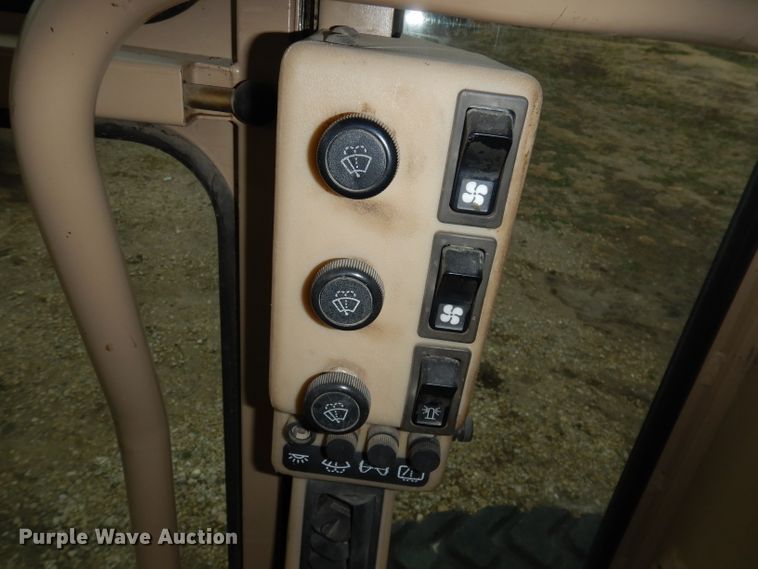 image for item DH8933 1998 Caterpillar 120H  motor grader