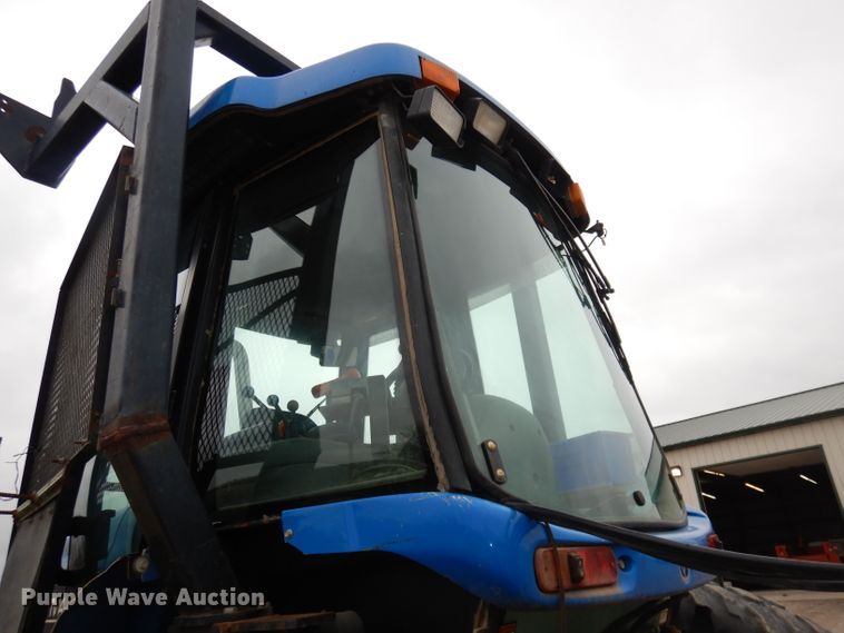 image for item DH8983 2001 New Holland TV140  bi-directional tractor